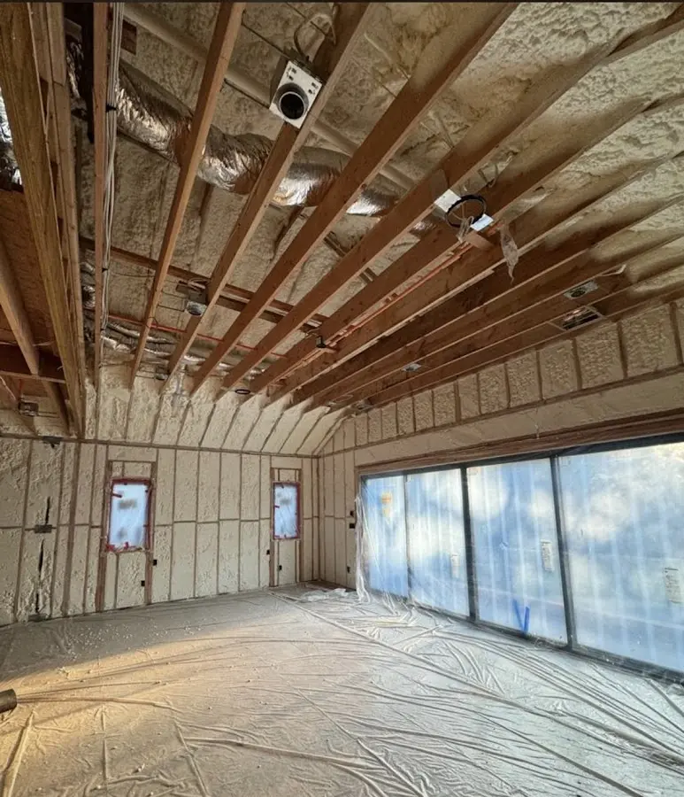 Interior walls and ceiling insulated with spray foam during new construction in Monett